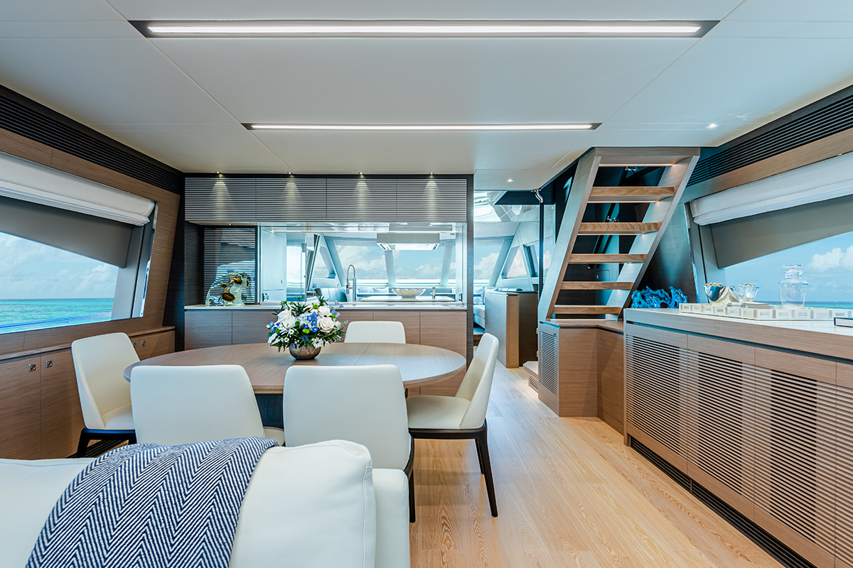 Forward dining area with view into galley.